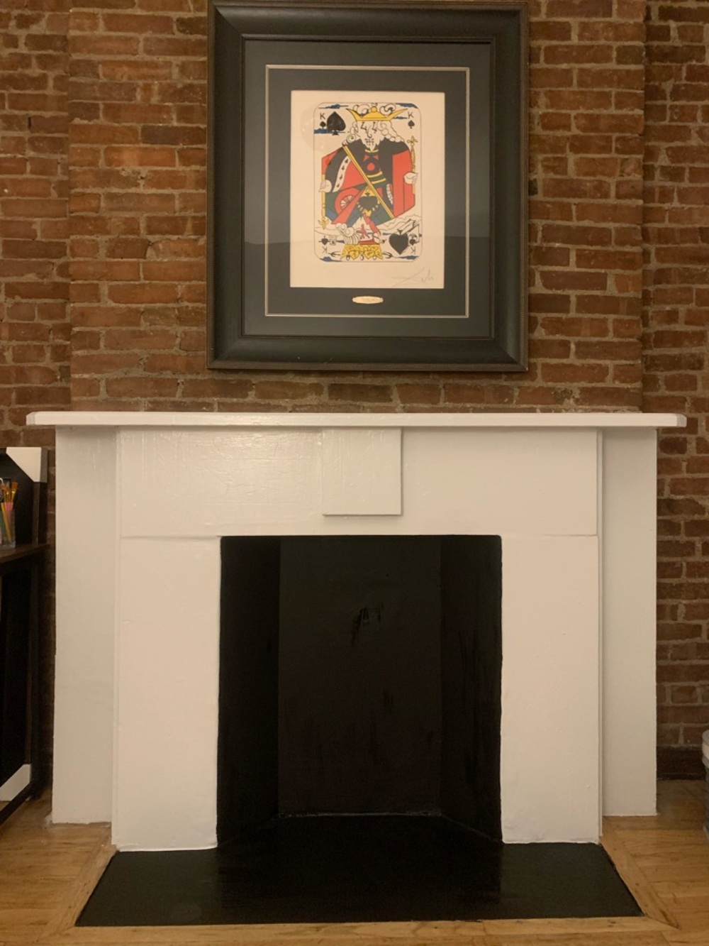 Oversized statement piece: Salvador Dali art + dark wood frame